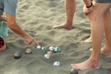Bacak ve insanlar veya erkekler bocce oyun