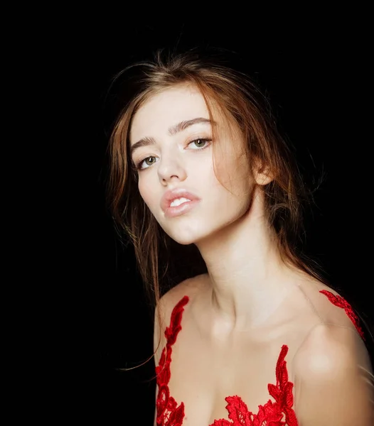 Pretty sexy woman with long hair in red embroidered bodysuit — Stock Photo, Image