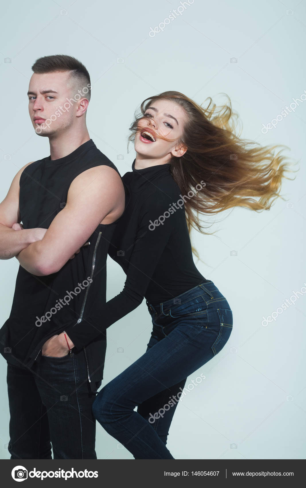 Pretty Sexy Woman With Long Hair And Man In Black Stock Photo