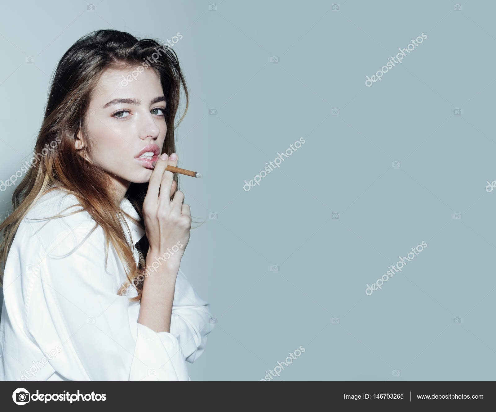Young blonde teen smoking cigarette can Young blonde teen smoking cigarette