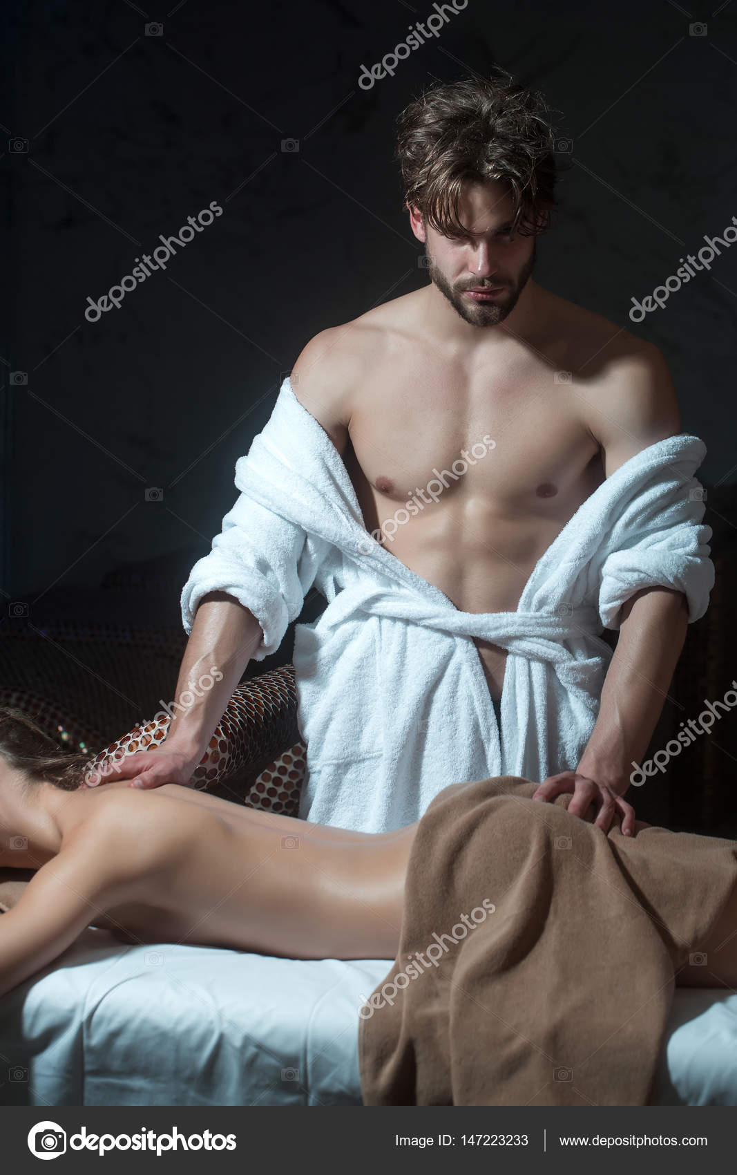 woman on salon with handsome therapist Stock Photo by ©Tverdohlib.com 147223233