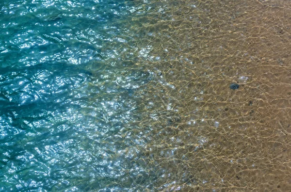 Shining green and yellow water in pool