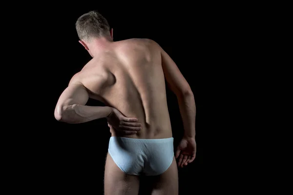 Rückenschmerzen junger Mann, der unter Schmerzen leidet, Gesundheitslösungskonzept — Stockfoto