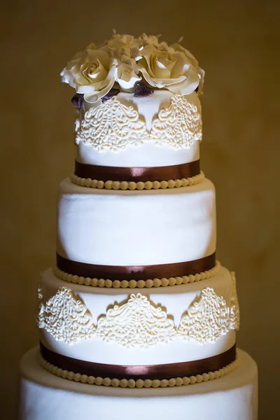 Traditional cake with white sugar pearls and cream roses. — Stock Photo, Image