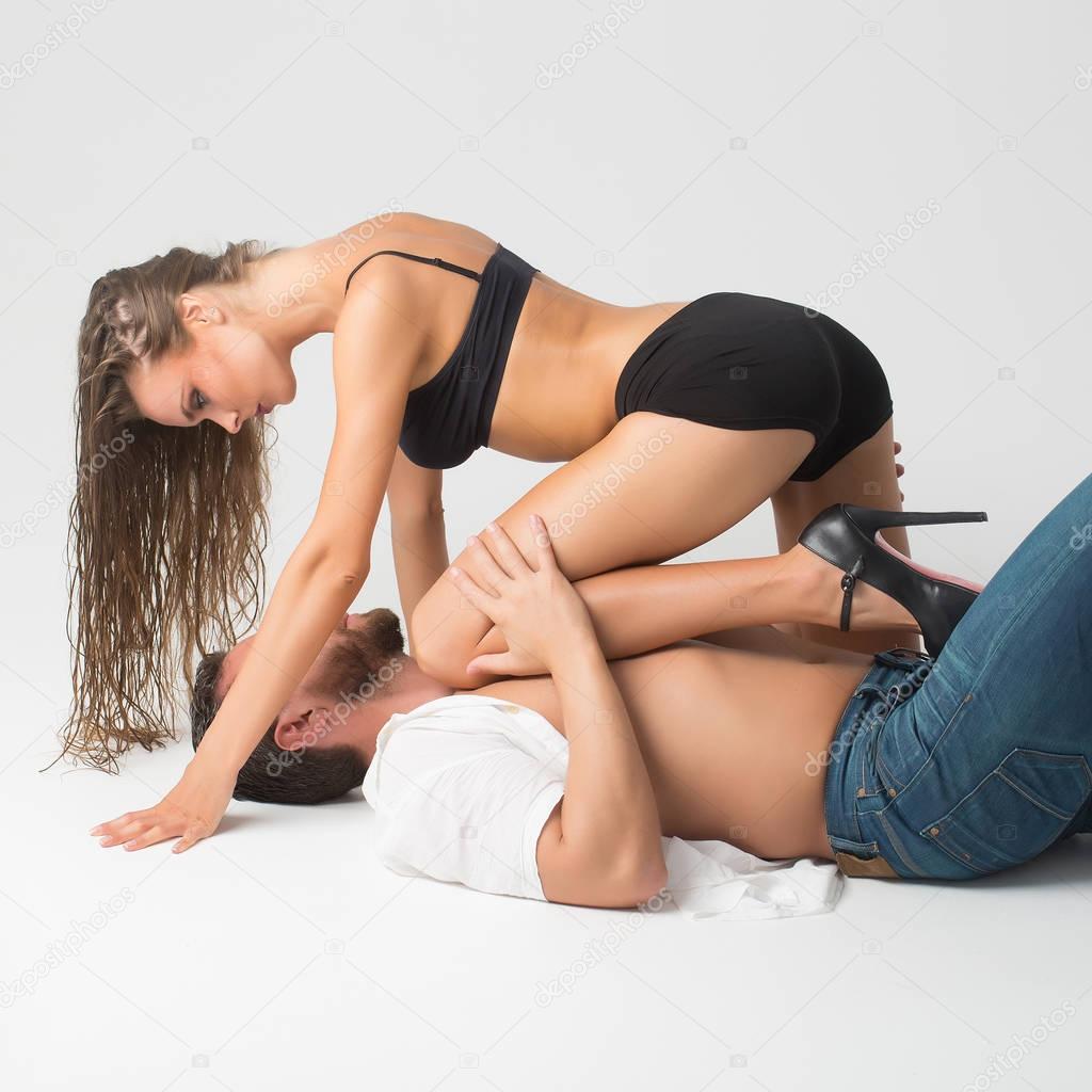 woman and bearded man lying on floor