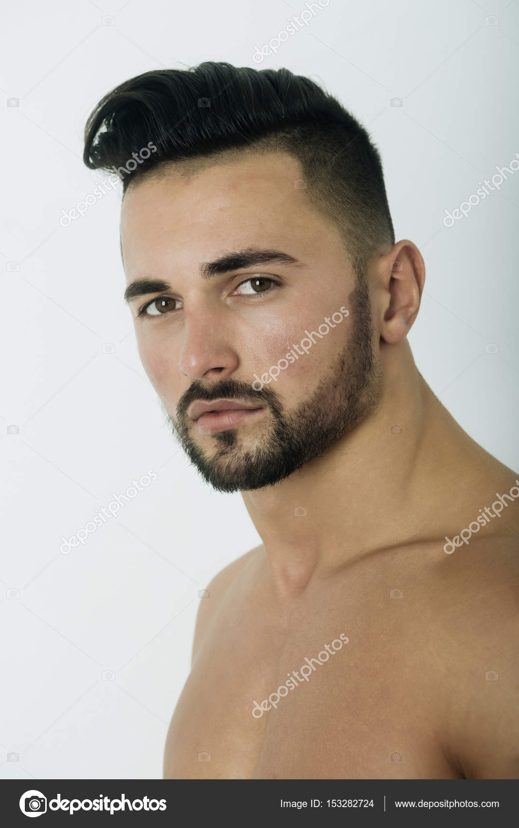 Handsome sexy man with unshaven face, beard and stylish hair Stock Photo by © 153282724 Handsome sexy man with unshaven face, beard and stylish hair Stock Photo by © 153282724