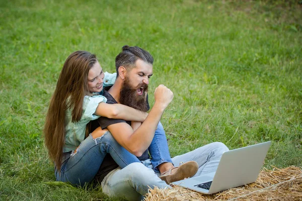 Couple of student and girl study on laptop on grass — Stock Photo, Image