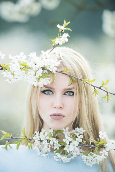 Woman portrait in spring or summer garden nature, fashion and youth