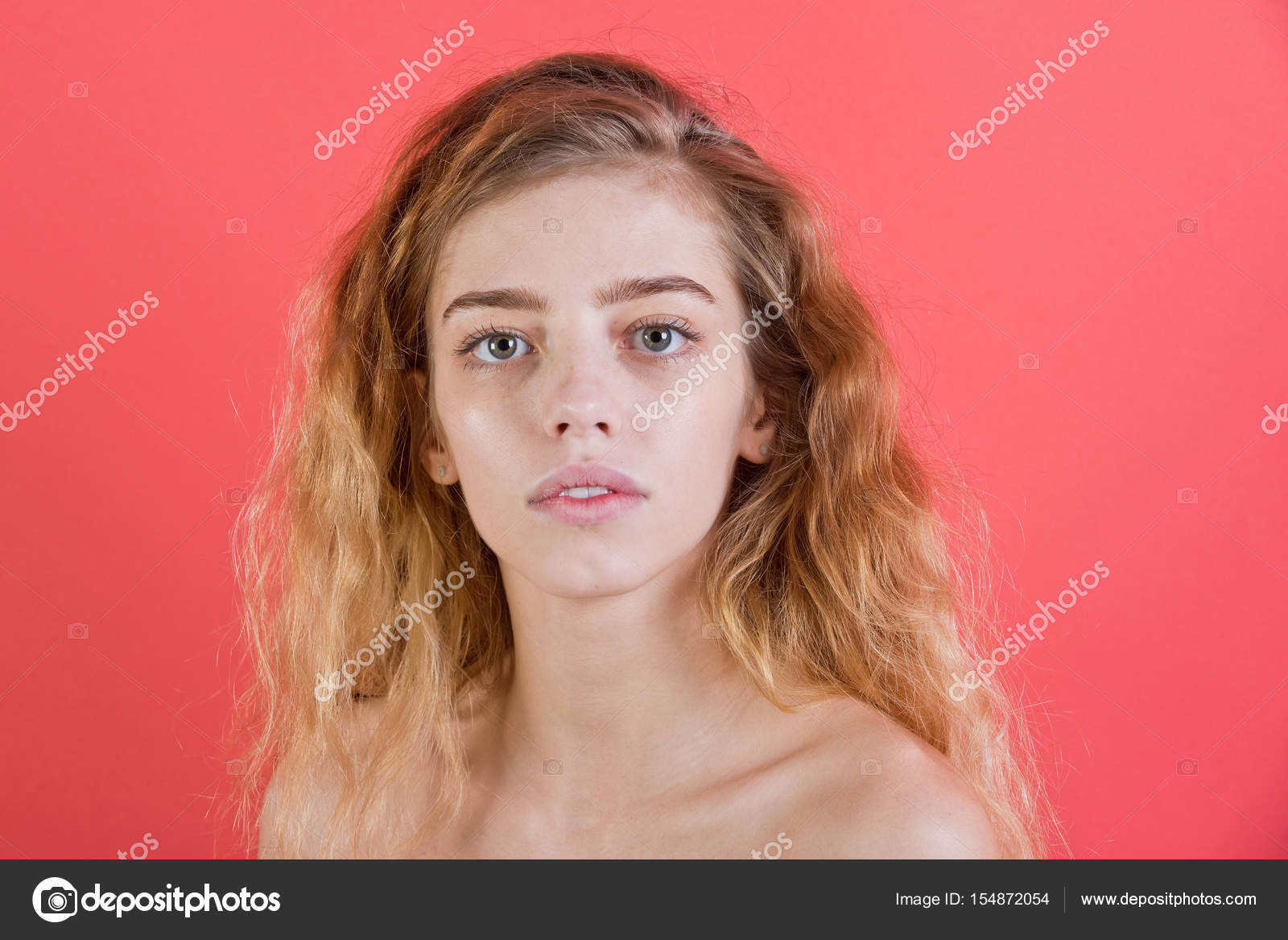 Girl With Pretty Face And Blond Long Wavy Hair Stock Photo