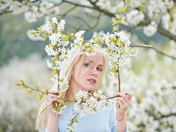 Young beauty and nature, girl, frame of white, blossoming flowers — Stock Photo, Image