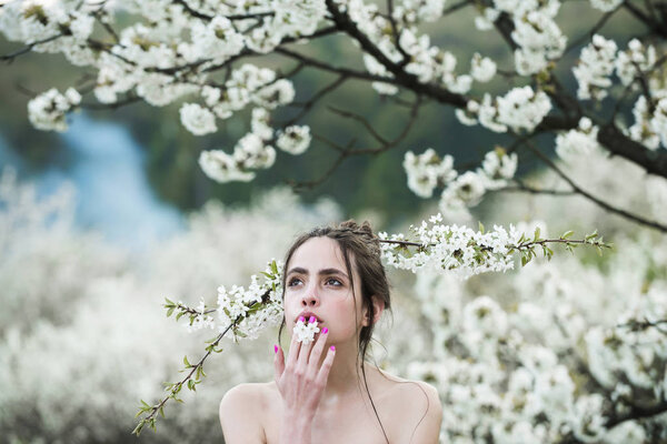 Beauty and fashion, spa and relax, spring and summer nature, girl in flowers