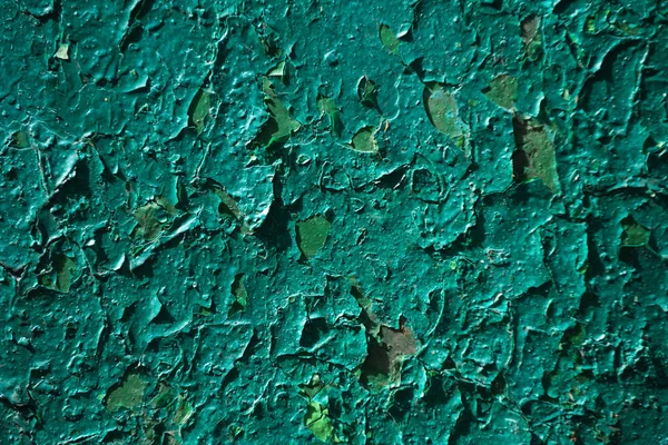 Φόντο χρώμα πράσινο παλτό ξεφλούδισμα και το ράγισμα από τοίχο — Φωτογραφία Αρχείου