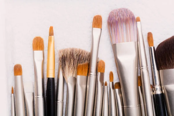 Makeup brushes with natural and synthetic fluff — Stock Photo, Image