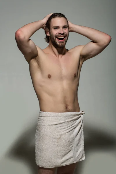 Happy man in white towel, morning wake up and shower — Stockfoto