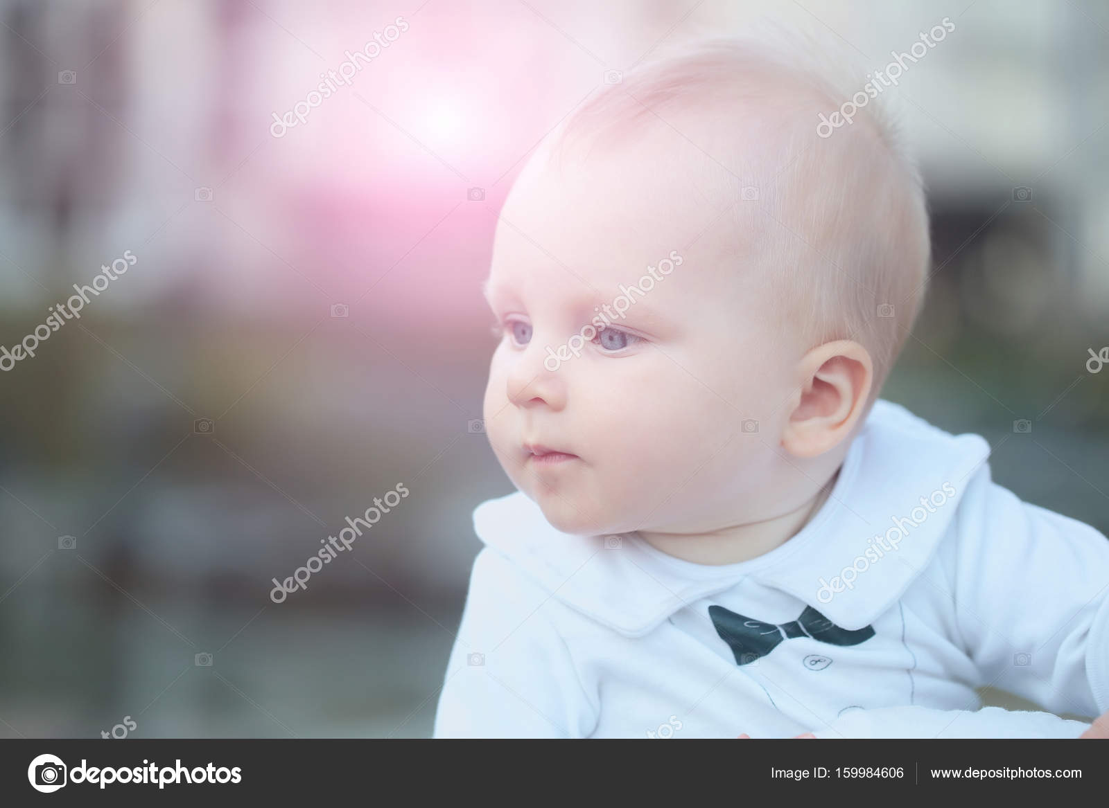Cute Baby Boy With Blue Eyes And Blond Hair Stock Photo