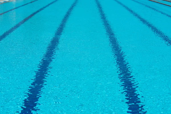 Empty swimming pool with blue clear trasparent water