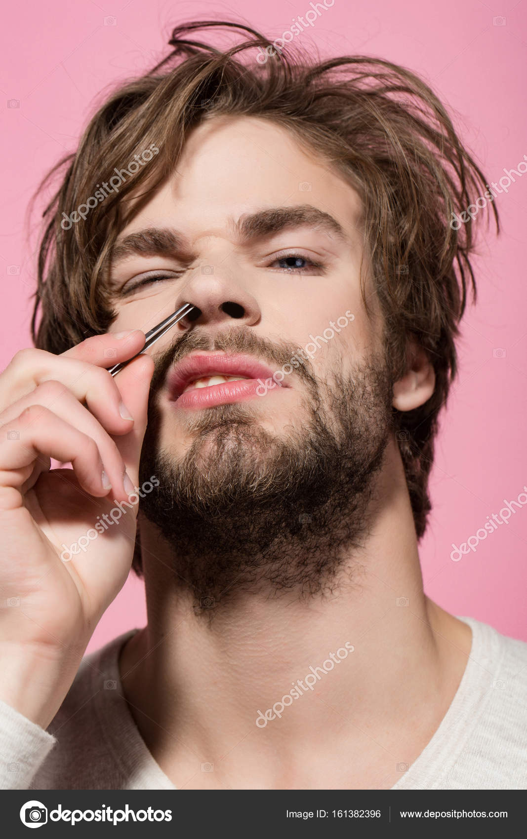 Man Twitch Nose Hair With Tweezers Stock Photo C Tverdohlib Com