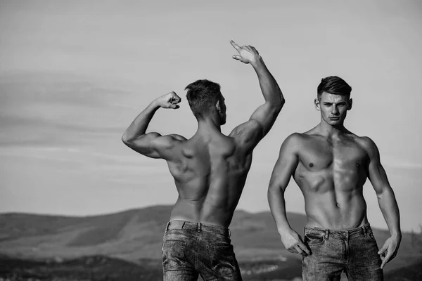 Twin men or bodybuilders — стоковое фото