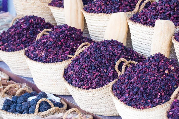 Dry herb hibiscus for tea in baskets.