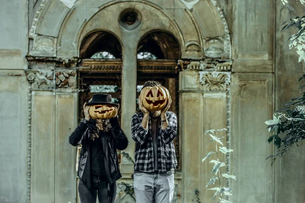 Halloween couple in love on abandoned building