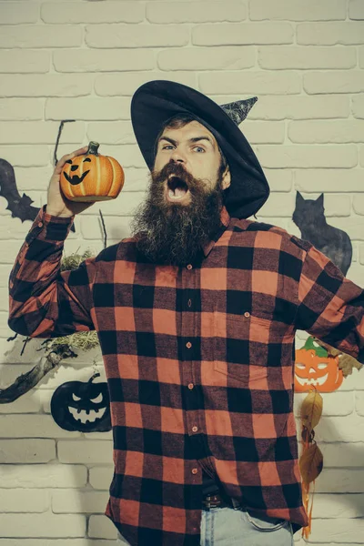 Halloween hipster with angry face in plaid shirt
