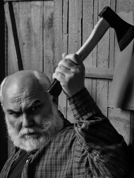 Man with axe and paper — Stock Photo, Image