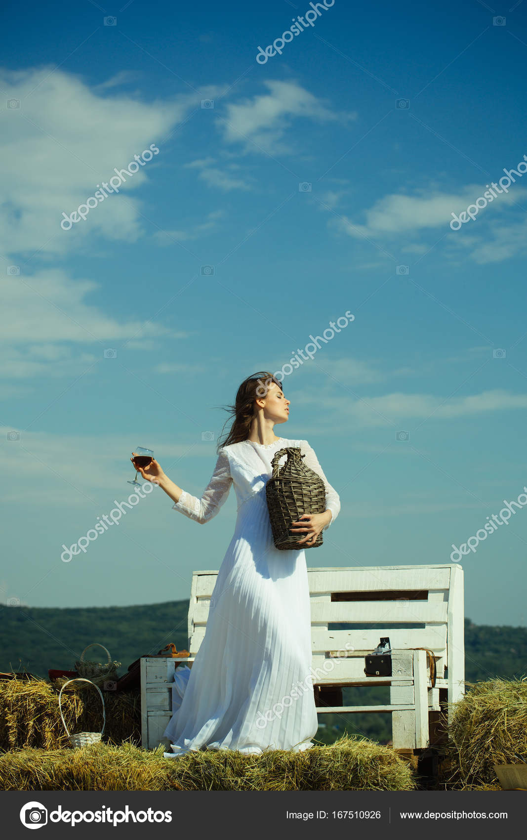 Girl In White Dress Posing On Blue Sky Stock Photo C Tverdohlib
