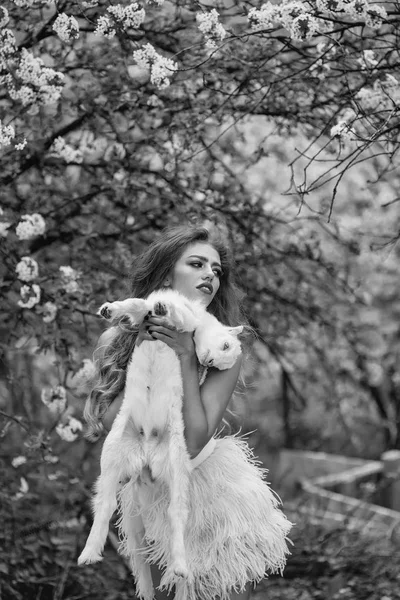 Sensual woman with small goat — Stock Photo, Image