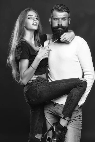 Man och kvinna med sax — Stockfoto