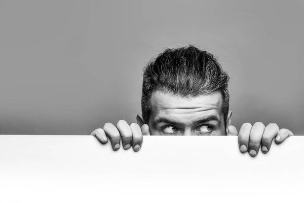 scared man with paper