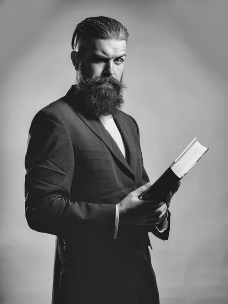 Bearded handsome man with book — Stock Photo, Image