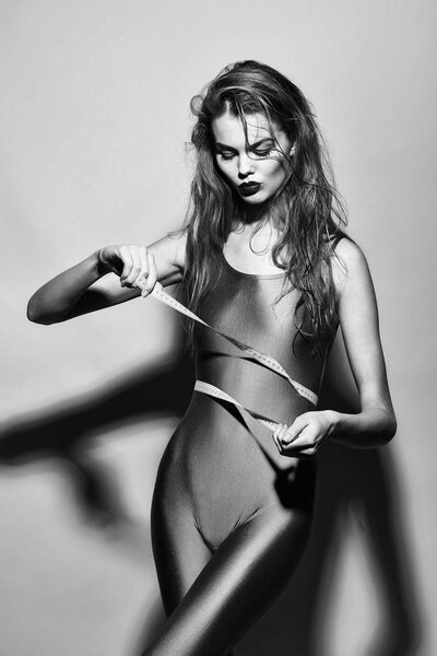 woman with measuring tape