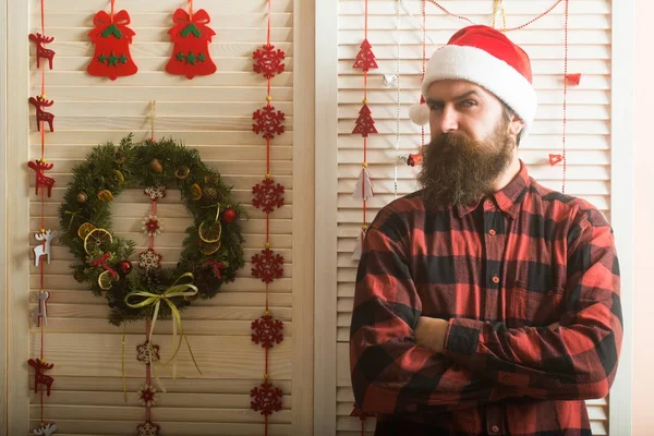 Christmas man with beard on serious face — Stock Photo, Image