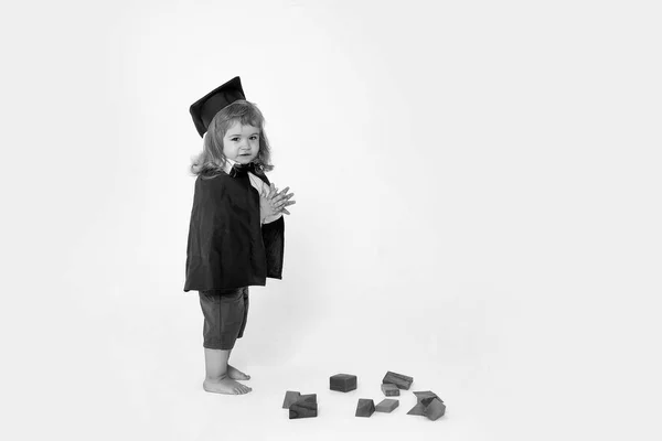 Cute boy in academic mantle — Stock Photo, Image