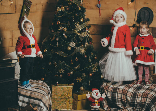 New year small girl and boy, happiness.