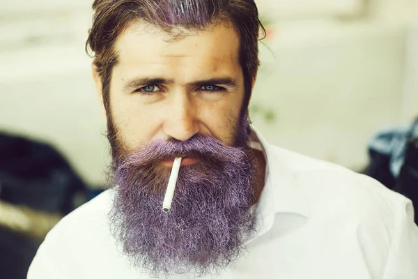 Bearded man with cigarette