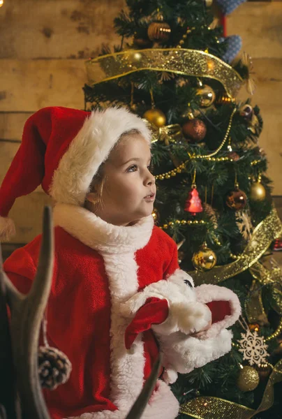 Navidad niño feliz con juguete . — Foto de Stock