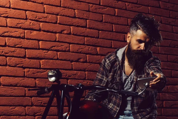 Bearded biker man on motorbike — Stock Photo, Image