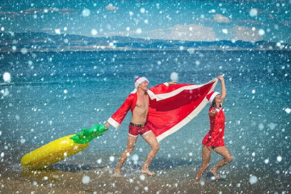 Couple in love of happy man and woman in water. — Stock Photo, Image