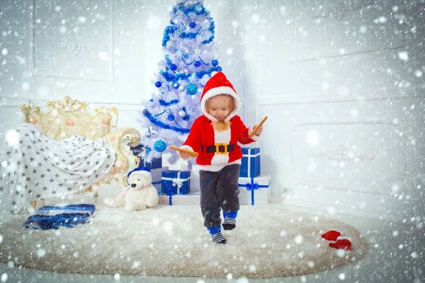 Santa claus kid with present box, black Friday.