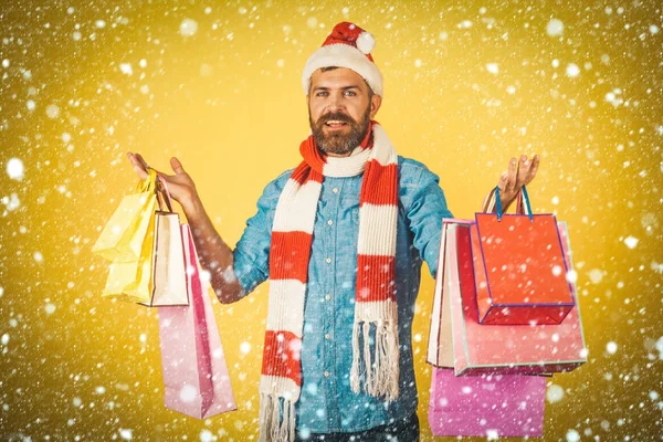 Christmas hipster shopper wear santa hat and scarf