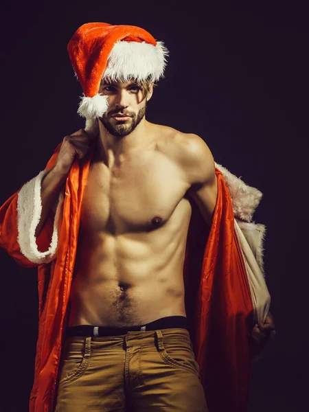 Handsome muscular christmas santa man — Stock Photo, Image