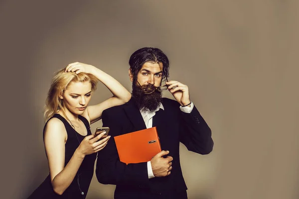 Serious man and woman — Stock Photo, Image