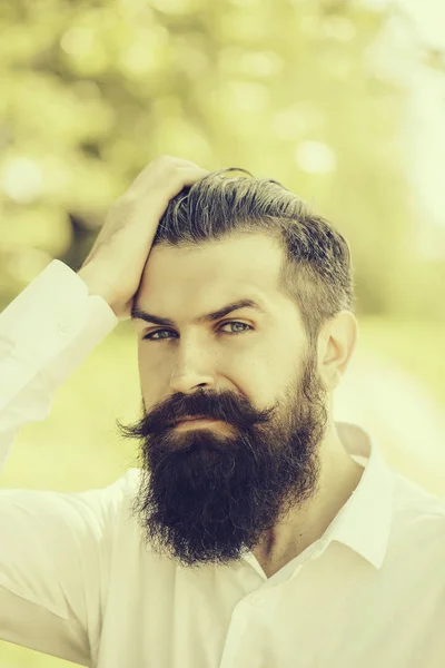 Bearded man on blue sky — Stock Photo, Image