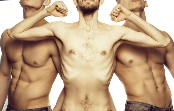Thin and muscular men pose — Stock Photo, Image