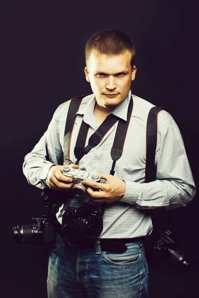 Photographer man with journalist cameras — Stock Photo, Image