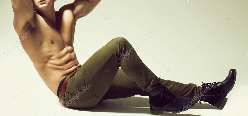 sexy muscular man athlete ytaining