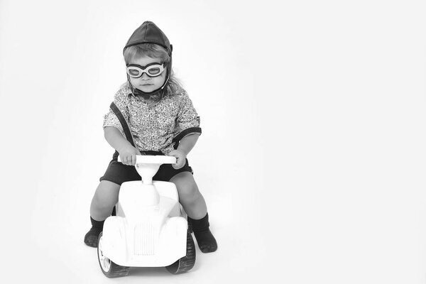 small boy driver or pilot isolated on white