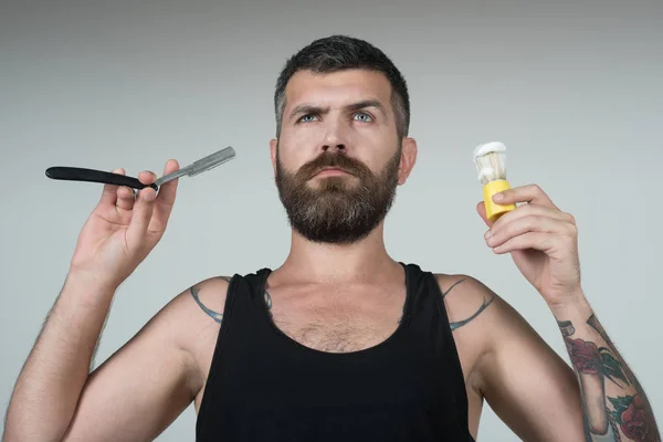 Man cut beard and mustache with razor and shaving brush. — Stock Photo, Image