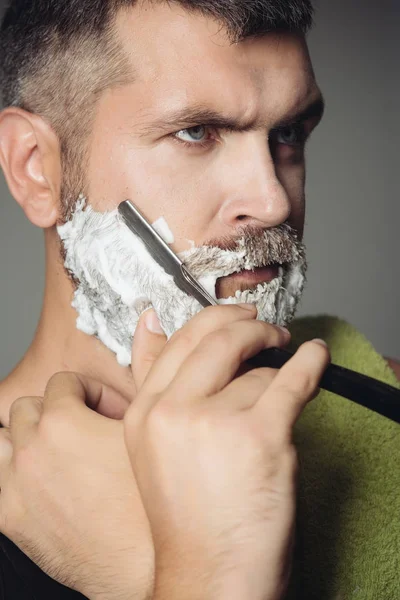 Man cut beard and mustache with razor and shaving brush — Stock Photo, Image
